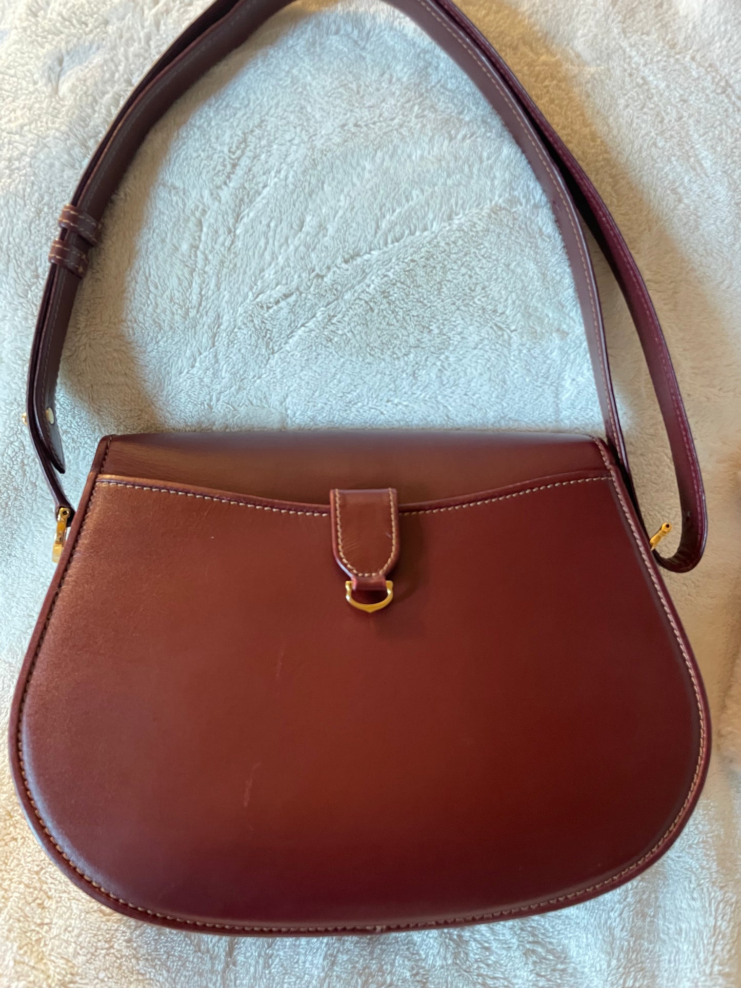 Must de Cartier bordeaux bag